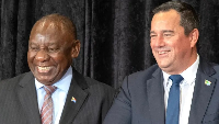 Ramaphosa (L) and Steenhuisen (R) agreed to form a coalition government. Credit: AFP