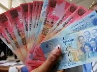 The cedi traded against the dollar at a mid-rate of 5.7542