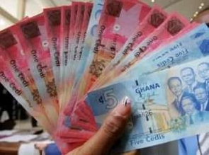 The cedi ended the trade week against the dollar at a mid-rate of 5.7318