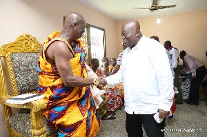 Nana Addo Dankwa Akufo-Addo and Oseadeayo Kwesi Kennin IV in a handshake