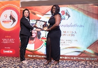 Mavis Leonards [right] receiving her award