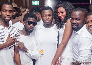 DJ Mensah middle with some celebrities