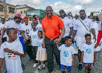 Herbert Mensah with some of the children during the walk