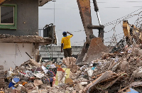 The three-storey building collapsed and killed nine people