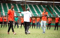 Former referee J.K Manu taking players through some of the laws