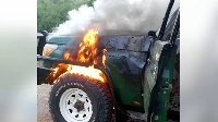 The attackers set the victims' vehicle on fire after killing them