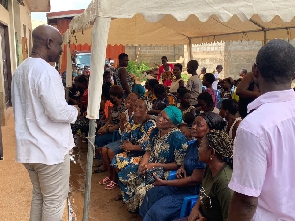 Rev. Eric Okpoti-Paulo interacting with some of the people