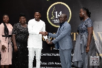 Daniel Aidoo, Project Manager - Cities and Habitat (2nd from left) receiving the award