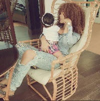 Nadia Buari with her baby