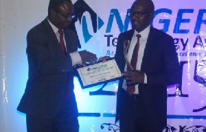 Bashir Kabir (right) Country Manager of West Blue, Nigeria taking the award