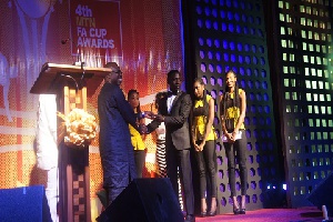Eric Opoku recieving an award at the 4th MTN FA Cup awards