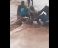 The man being rescued from the drainage