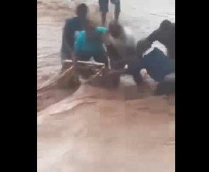 Man Being Rescued From Being Sucked Into Drainage 