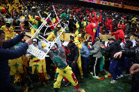 Senegal fans clash security after Morocco VAR penalty sparks pitch invasion