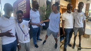 Gabby Asare Otchere-Darko with some players of the Black Queens