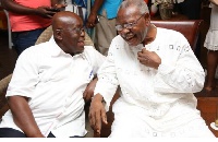 President Akufo-Addo in a hearty laugh with the late J. H. Mensah