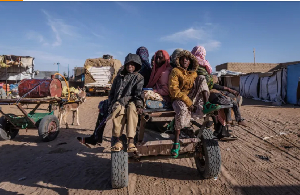 Sudanese refugees prepare to ride back to their temporary shelter in Oure Cassoni, Chad Sudanese refugees prepare to ride back to their temporary shelter in Oure Cassoni, Chad