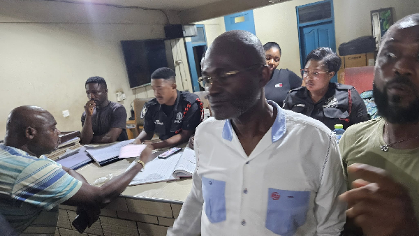 Kennedy Agyapong captured at the police station in the aftermath of the stabing incident