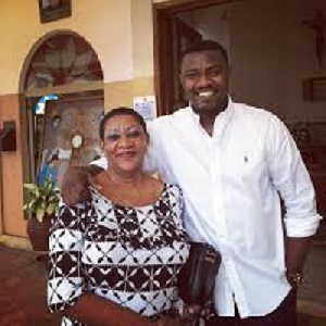 John Dumelo and his mother as she turns 65