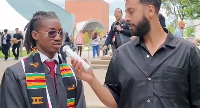A picture of Prince Debrah Jr speaking in an interview