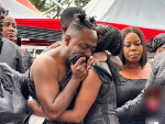 Choirmaster breaks down while filing past late wife Beverly Afaglo's remains Choirmaster breaks down while filing past late wife Beverly Afaglo's remains