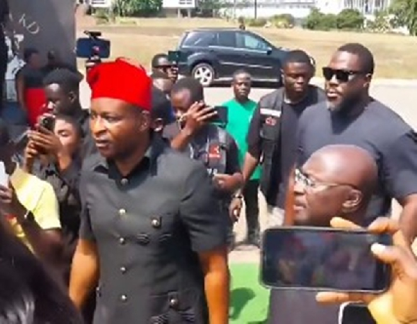 Chairman Wontumi (in red hat)  was spotted with Dr Bawumia (right) at the funeral
