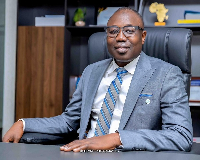 Alhaji Dr Doliwura Zakaria, Managing Director of National Investment Bank PLC