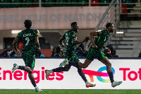 Players of Nigeria celebrating their opener