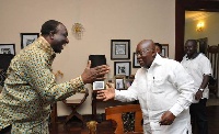 President Nana Addo Dankwa Akufo-Addo shaking hands with Alan Kyerematen