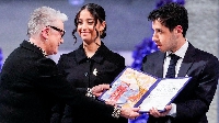 Teenage twins of jailed Iranian activist Narges Mohammadi don accept di Nobel Peace Prize for am