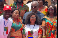Mahama during the session, gently pulled the young lady back to stand in front of him