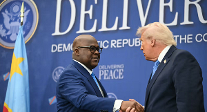 US President shakes hands with the President of the Democratic Republic of Congo