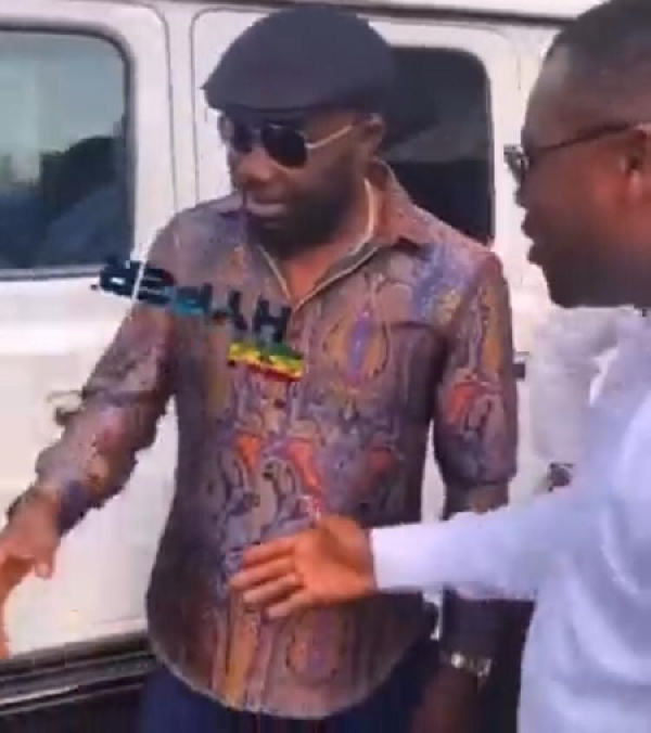 Osei Kwame Despite skips Abeiku Santana's handout for a handshake