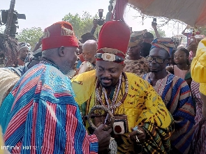 His Royal Majesty Pe Dr. Atudiwe Atudiparee Manchi III in Royal regalia receiving homage