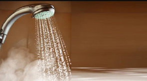 File photo: Hot water running through a shower head