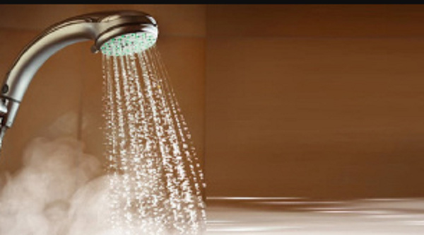 File photo: Hot water running through a shower head