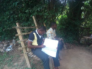 Teachers sitting under trees due to lack of staff room