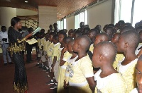 MP for North Dayi, Joyce Tetteh, interacting with the students from St Joseph R.C Basic Schools