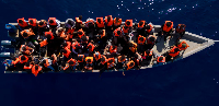 Migrants in the Mediterranean Sea before being rescued by the Spanish NGO Open Arms, 2023