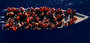 Migrants in the Mediterranean Sea before being rescued by the Spanish NGO Open Arms, 2023