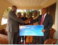 Stanbic Bank has handed over a check of GHC10,000 to the Likpe Educational and Social Fund