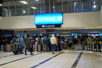 Ghanaian nationals arrive at O.R. Tambo International Airport ahead of repatriation flight to Ghana