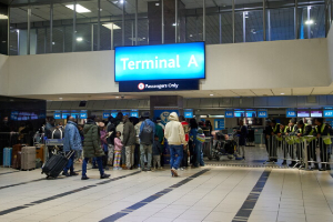 Ghanaian nationals arrive at O.R. Tambo International Airport ahead of repatriation flight to Ghana