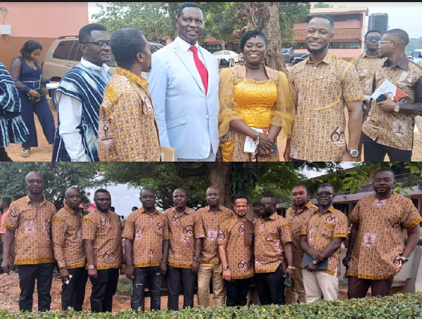 Wearing a suit with a red necktie is the Education Minister, Dr. Yaw Osei Adutwum