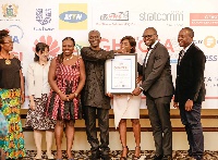 Staff of Guinness Ghana Breweries Limited receiving their award