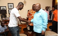 Nana Addo Dankwa Akufo-Addo, President of Ghana exchanging a handshake with Agya Koo