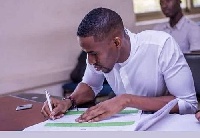 Ibrah 1 signing marriage certificate in court
