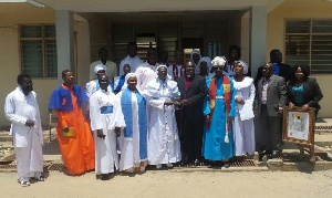 Rev. Dr. Kwabena Opuni-Frimpong with representatives of the Spiritual Churches Council