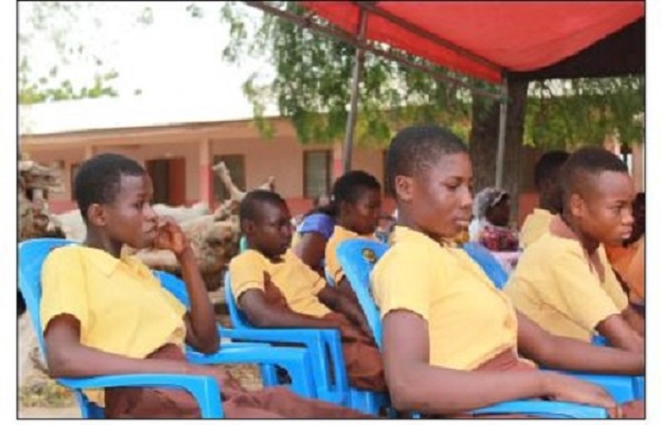 Junior High School pupils seated at an event
