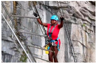 A Ghanaian woman climbs China's 168-metre Sky Ladder